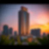 Al Shafar Tower: Architectural Elegance at Sunset Stunning view of Al Shafar Tower at sunset showcasing its architectural elegance.