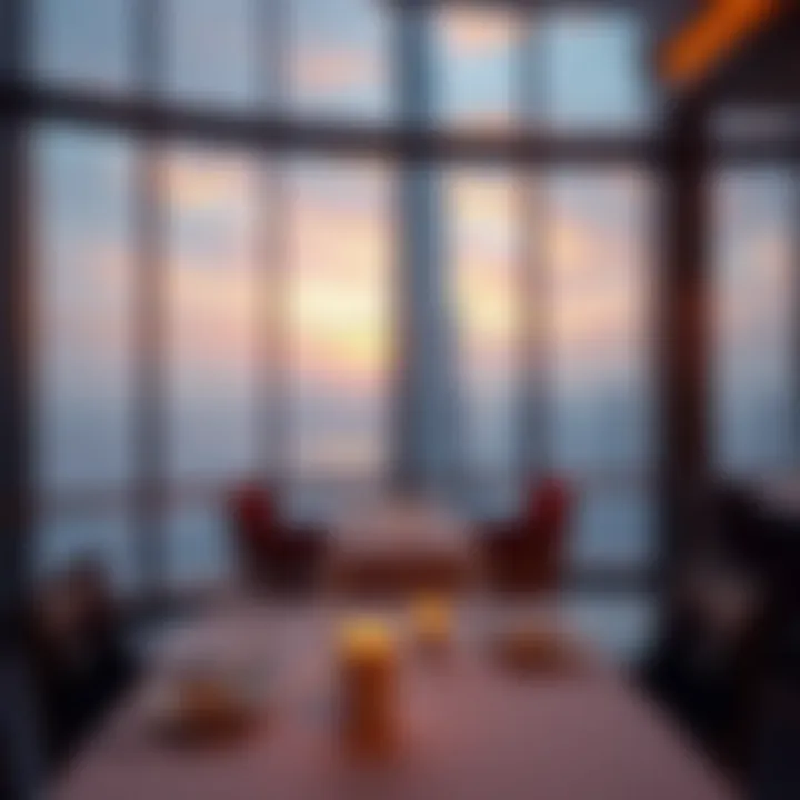 Elegant dining setting with a view of Burj Khalifa at sunset.