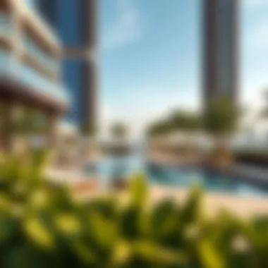 Relaxing amenities at JVC Tower including a pool and green spaces