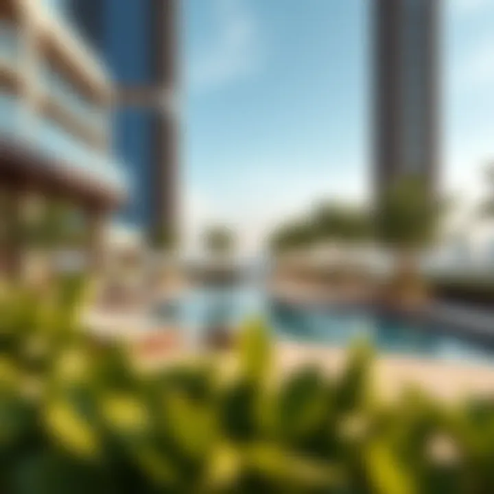 Relaxing amenities at JVC Tower including a pool and green spaces