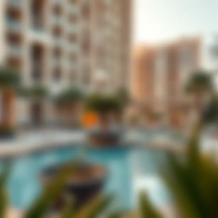 Elegant outdoor pool area of the Al Jaziri Building surrounded by lush landscaping