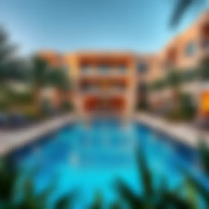 Glistening swimming pool surrounded by lush greenery at the property