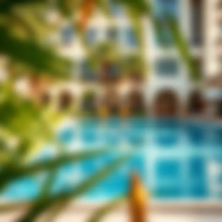 Exquisite Pool Area at Savoy Park Exquisite pool area surrounded by lush greenery at Savoy Park