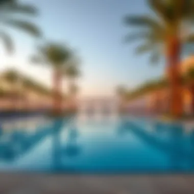 Luxurious swimming pool area at Wasl Port Views Building 8 surrounded by palm trees